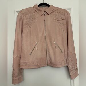 Eva Kayan blush coloured jacket.